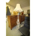 White painted wrought iron and brass telescopic standard lamp with shade