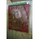 'Red Indian of Alberta' framed panel, comprising brown hide segment painted with profile of 'Good