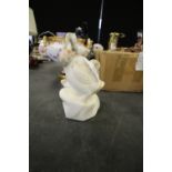 Carved marble ducklings