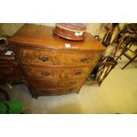 Burr walnut bow 4 drawer chest on bracket feet