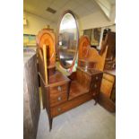 Edwardian mahogany dressing table with a similar oval mirror