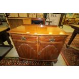 Mahogany bow front cabinet