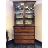 George III mahogany and rosewood banded Secretaire bookcase, 109cm wide x 60cm deep x 214cm high,