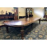 Victorian pollard oak and ebonised extending dining table, fitted five leaves on six carved and