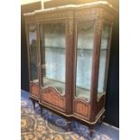 French gilt metal mounted mahogany breakfront vitrine, with pink and grey veined marble slab to top,