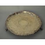 Victorian silver plated salver by MH & Co, with pie crust rim on three splayed claw and ball feet,