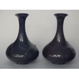 Pair Japanese Meiji period dark brown patinated bronze vases, the bodies cast in relief with carp,