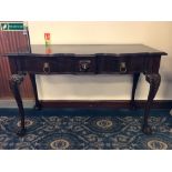 1920's figured mahogany serving table of Georgian design, fitted two drawers with lions mask and