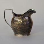 George V silver cream jug of 19th Century design by A. Marston & Co, Birmingham 1931, 10cm high,