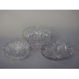 Three heavy cut glass bowls, possibly American, 23cm diameter, 21cm diameter and 19cm diameter