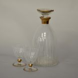 Mid-Century gilded white and clear striped decanter and pair of glasses, possibly Baccarat