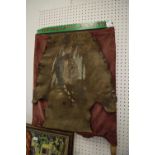 'Red Indian of Alberta' framed panel, comprising brown hide segment painted with profile of 'Good