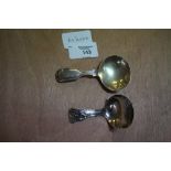 Victorian silver fiddle and thread oversize caddy spoon by Walker & Hall, Sheffield 1874 and one