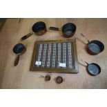 Glazed 'band sampler' tray and quantity of copper sauce pans etc
