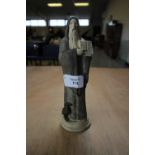 Matt Glazed Figure of Standing Monk marked Doulton to base with letters APX over Crossed Keys