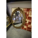 19th Century gilt framed oval wall mirror