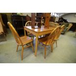 Ercol dining table and 5 Ercol chairs