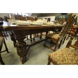 Large carved oak refectory table with cup and cover legs