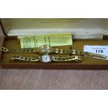 2 ladies gilt metal wristwatches, boxed