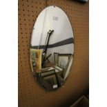 Oval frameless mirror