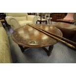 Circular carved oak coffee table