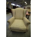 Winged Armchair with polka dot patterned upholstery