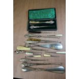 Silver handled shoe horn and button hook set, cased and a collection of shoe horns and button hooks