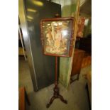 Early Victorian mahogany pole screen, rectangular frame set with Berlinwork with lady and dog