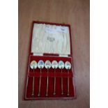 Set of 6 silver gilt enamelled coffee spoons, cased, Birmingham 1958