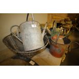 4 vintage watering cans and swill