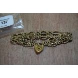 9ct gold gate bracelet - heart shaped padlock clasp