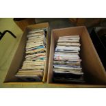 2 boxes of single records 70s and 80s