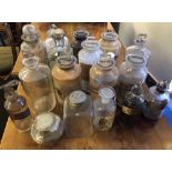 Sixteen Victorian and later clear glass Medicine bottles, some damaged
