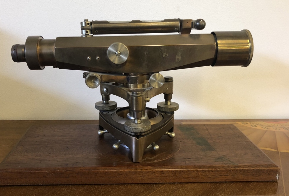 Stanley 57394 brass Theodolite, on wooden plinth, 36cm x 16cm x 21cm high