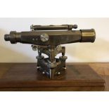 Stanley 57394 brass Theodolite, on wooden plinth, 36cm x 16cm x 21cm high