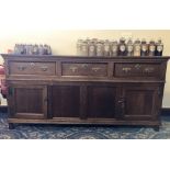 18th Century panelled oak dresser base, 188cm wide x 50cm deep x 92cm high