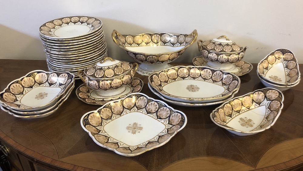 Early 19th Century Wedgwood pottery part dinner service decorated in blue, pink and gilded with