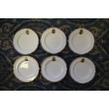 Set of six Copeland bone china plates, each enamelled with the coat of arms of Sir Samuel Scott of