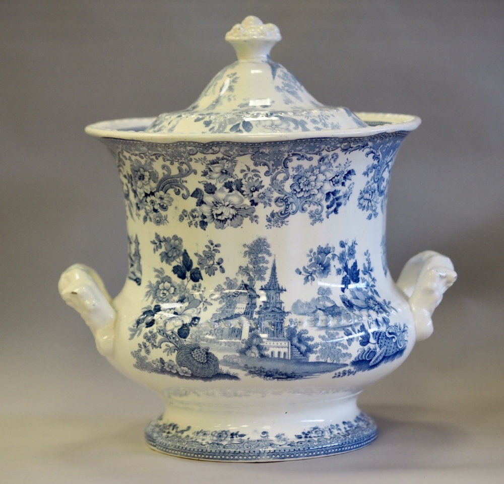 19th Century blue and white 'Pagoda' pattern pottery lidded urn, 36cm high (lid repaired)
