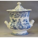 19th Century blue and white 'Pagoda' pattern pottery lidded urn, 36cm high (lid repaired)