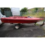 Fibreglass leisure boat (A/F) on trailer (see staff member to view)