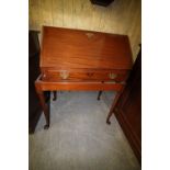 Mahogany fall-front writing desk on stand