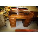 Oak tambour fronted desk