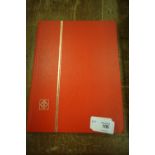 Red hardbound UK & foreign stamp album including Gibraltar, Isle of Man, World Cup 1966, etc