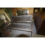 Pair of heavy cast iron and hard wood garden benches with lattice backs