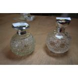 2 silver top Victorian perfume bottles