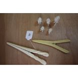 2 ivory glove stretchers and ivory elephants etc