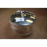 Silver top glass powder jar