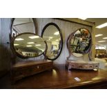 2 19th century Mahogany Swing Mirrors