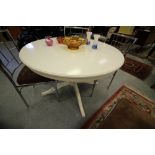 Round White Pedestal Table with Leaves